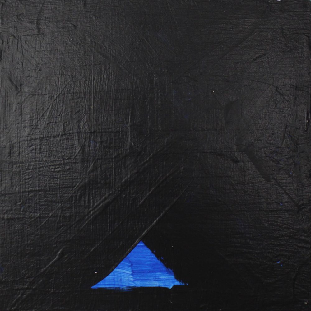 Blue Triangle in Darkness